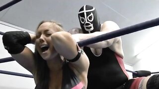 Brunette woman submits to Titan in wrestling domination